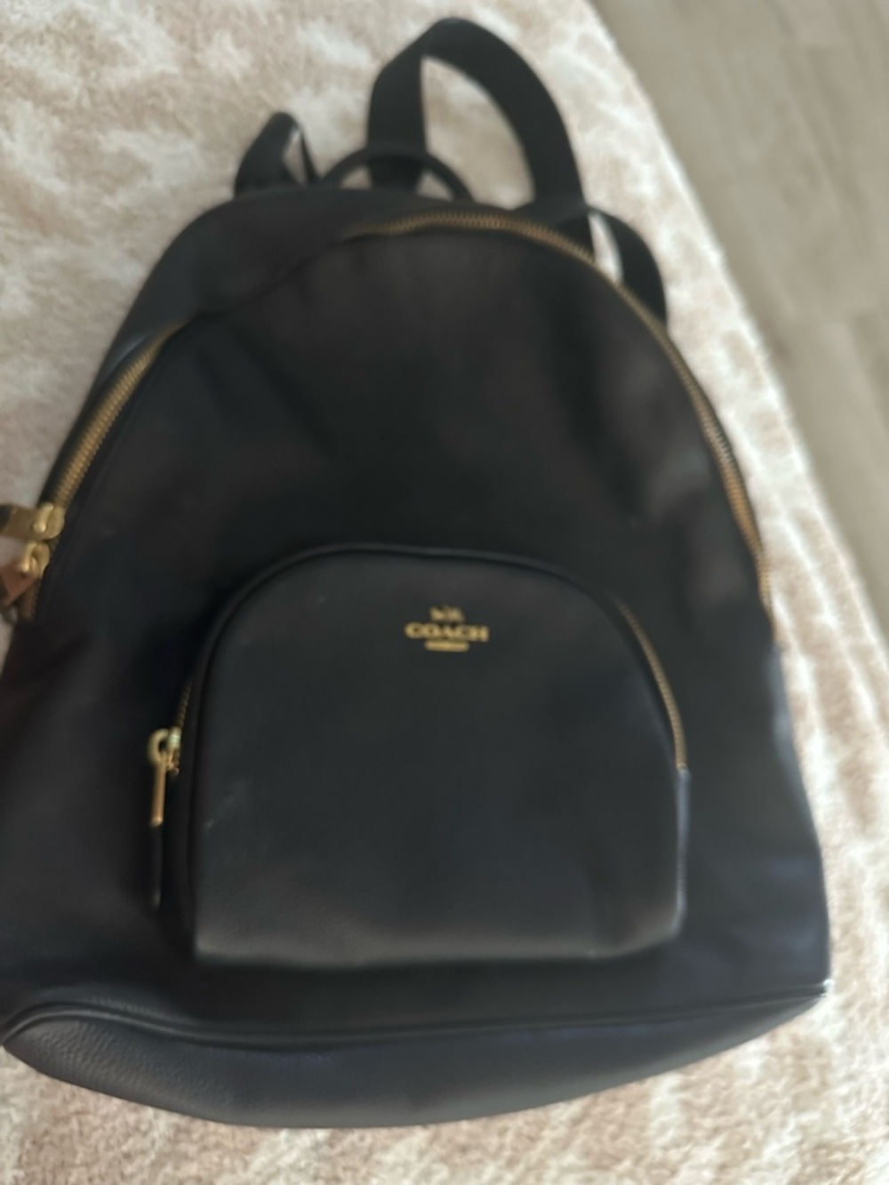 Coach Black Leather Backpack with Gold Accents